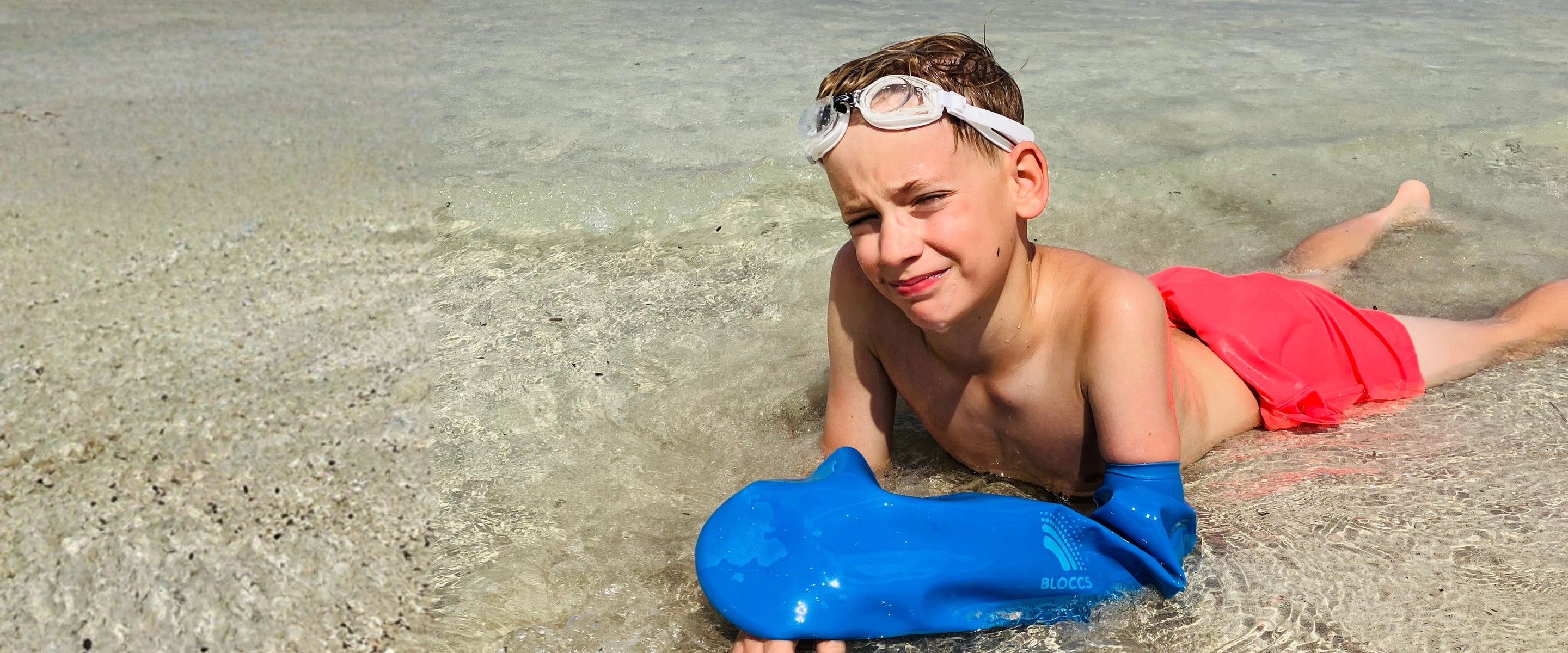 Child swimming while wearing Bloccs waterproof arm covers